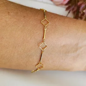 Pulseira dourada  palito e trevo vazado