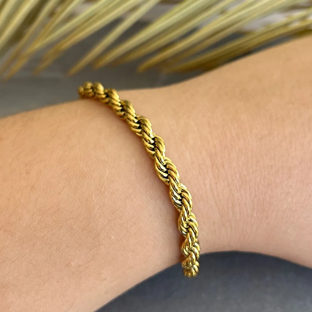 Pulseira em aço cordão baiano dourada