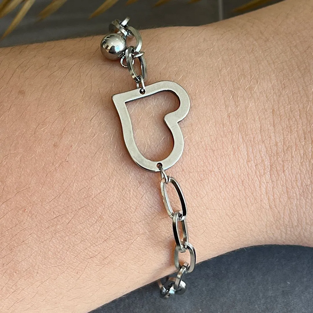 Pulseira em aço com pingente coração