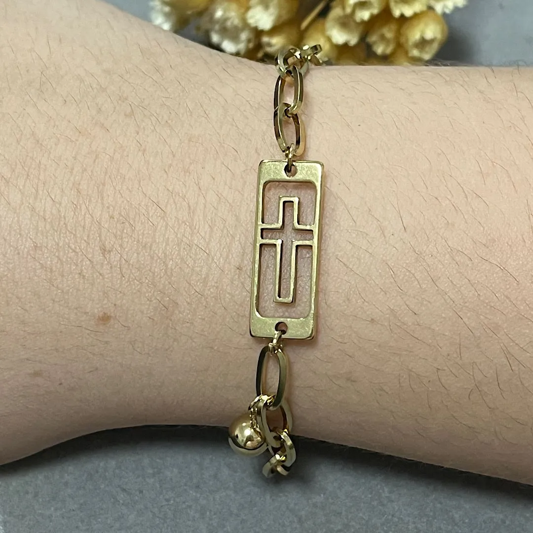 Pulseira em aço dourado crucifixo vazado