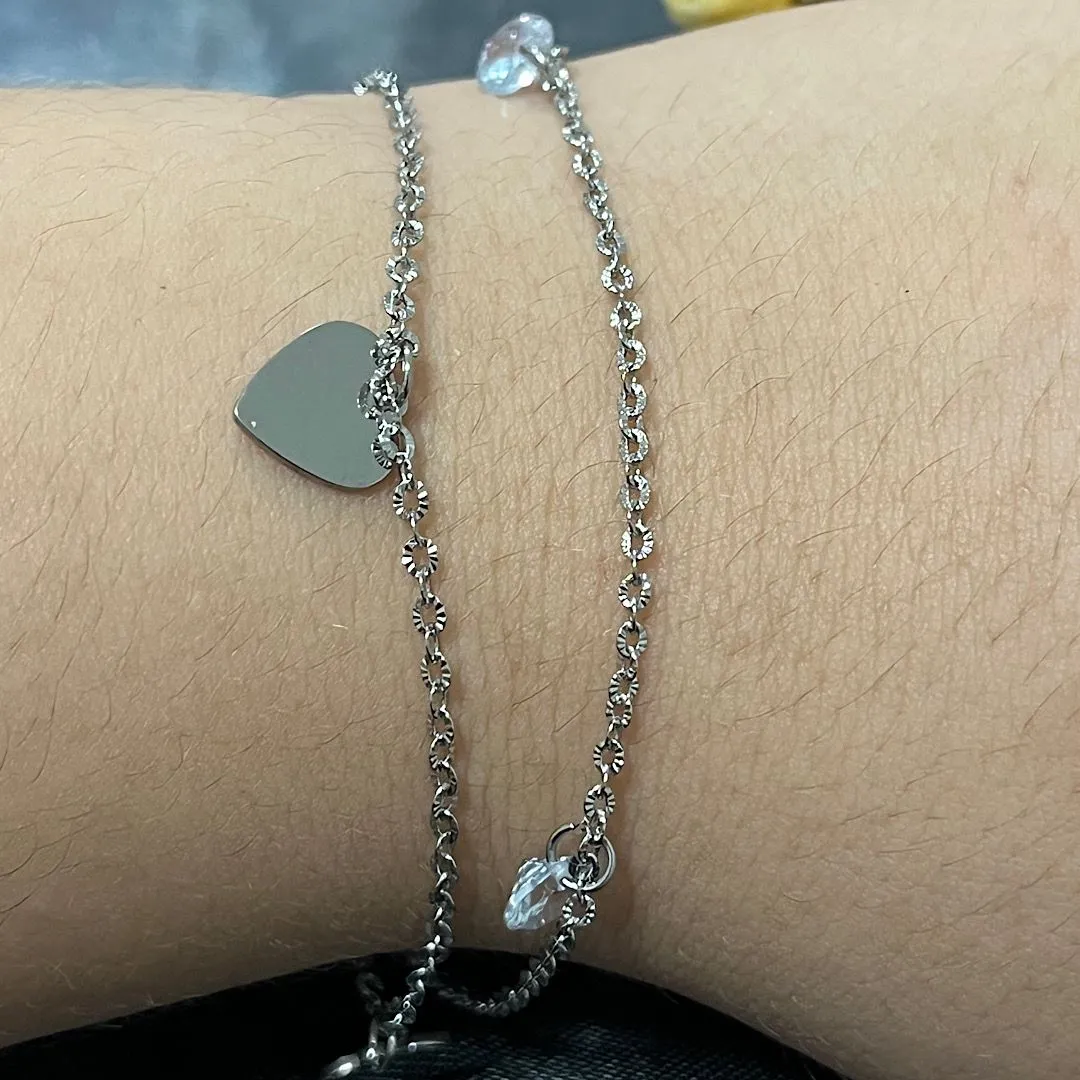 Pulseira em aço dupla coração cheio