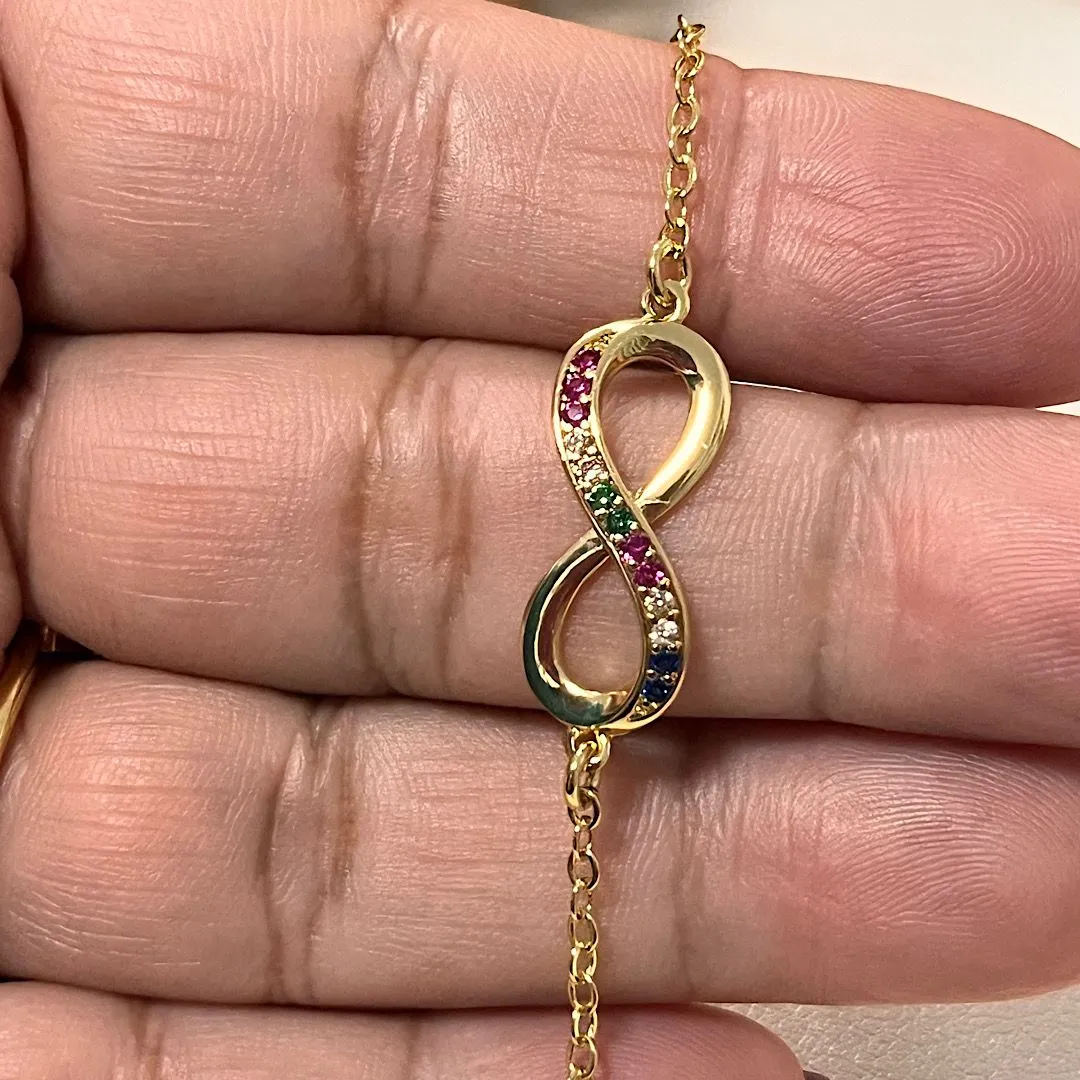 Pulseira com pingente infinito