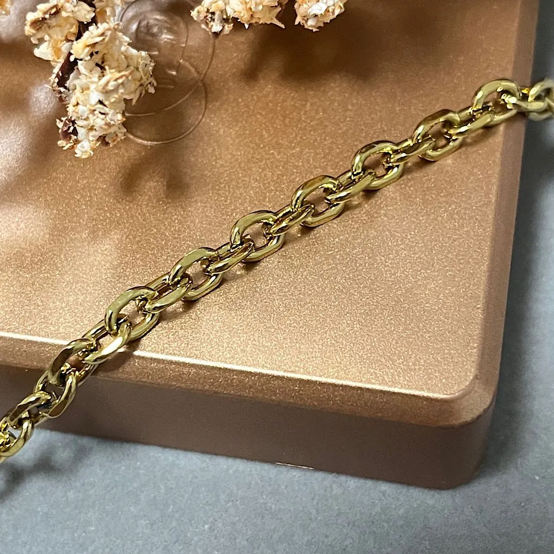 Pulseira com fecho trava em aço dourado